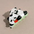 Détail de la pince à cheveux panda en acétate perlé avec base verte transparente - Deux Pandas