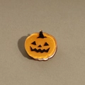 Dettaglio di una molletta per capelli a zucca arancione con viso nero di Halloween - Piccola Zucca Verde / 2,7cm