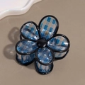Detail of flower hair claw clip with blue and white plaid pattern and black acrylic edges - Blue Flower