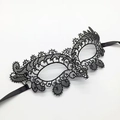Detailed view of black lace fox mask with intricate embroidery and satin ribbons - Mask 7