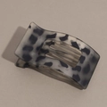 Close-up of matte leopard print hair claw clip showing curved teeth and flat design - Matte Gray Leopard