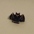 Halloween black bat hair claw clip with orange accents and glitter finish - Orange Eyed Bat