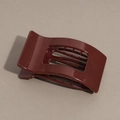 Detail view of the glossy burgundy flat hair claw clip with a hollow rectangular design - Shiny Red
