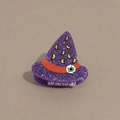Detail of purple glitter wizard hat hair claw with orange band and spooky eyeball - Purple Witch Hat