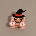 Close-up of glittery orange pumpkin hair claw clip with a black wizard hat detail - Pumpkin with Witch Hat
