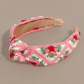 Detalle de patrones florales de ganchillo rosa y blanco con nudo en la diadema - Rosa Verde Anudado