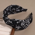 Detail of floral wide headband showing the top knot texture and soft fabric material - Knotted Floral Black