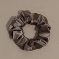 Detail of dark brown satin scrunchie showing smooth metallic silk texture and soft folds - Scrunchie / Dark Brown