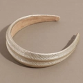 Close-up of champagne gold snakeskin texture wide headband with soft non-slip lining - Champagne Gold