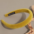 Detailed macro view of ginger yellow velvet padded headband with handmade label - 2cm / Yellow-2cm