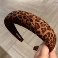 Detailed macro view of the handmade leopard print sponge headband with soft plush texture - Brown Medium