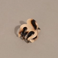 Detail view of acetate tortoise shell hair claw clip with France Handmade logo - Beige Leopard