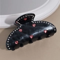 Dettaglio molletta per capelli in marmo nero con cuori rossi e strass scintillanti - Cristallo di Cuore Nero