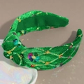 Detail of green velvet wide headband featuring colorful sequins and top knot design - Velvet Rhombus Sequin Green
