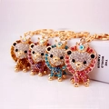 Sparkling rhinestone lion keychains with gold crowns in brown purple blue and pink - Random Color