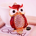 Exquisite red owl keychain with crystal rhinestones on a golden branch setting - Red