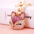 Sparkling fox head keychain with pink rhinestones and elegant faux pearl charms - Purple