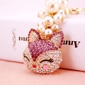 Charming fox keychain with purple rhinestones and white pearls on golden settings - Purple