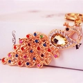 Colorful crystal peacock keychain in gold alloy finish with sparkling rhinestones - Gold