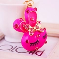 Pink rhinestone cartoon rabbit keychain with gold bow and zinc alloy finish - Rose Red