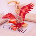 Portachiavi creativo con aquila in lega dorata con ali di cristallo rosso per borse - Rosa