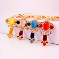 Quattro portachiavi cinesi a forma di chiave con pietre colorate e strass luccicanti eleganti - Colore Casuale