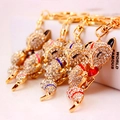 Crystal fox keychains in colorful enamel and gold alloy set of four on white background - Random Color