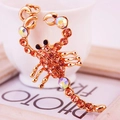 Portachiavi a forma di scorpione dorato con strass arancioni e cristalli arcobaleno - Pesca