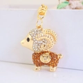 Cute gold alloy goat keychain featuring amber rhinestones and a secure metal clasp - Coffee