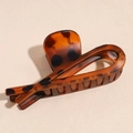 Elegante pinza per capelli in resina tartarugata con design a cuore opaco per donna - Stampa leopardata ambra