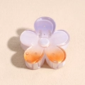 Close-up of a gradient acrylic frangipani hair claw clip with purple and orange tones - 4cm / Flower Purple Orange
