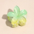 Detail view of Frangipani hair claw clip with gradient green acrylic and pearlescent finish - 4cm / Lily Green Yellow