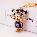 Creative tiger keychain with blue enamel and sparkling rhinestones on golden metal - Blue