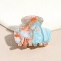 Close-up of large acetate hair claw clip with blue and orange marble texture design - Blue Orange Gradient