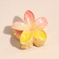 Macro view of gradient pink plumeria hair claw clip with pearlescent shimmer texture - 4cm / Lily Orange Yellow