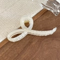 Elegant cream white marble texture hair claw clip with minimalist curved resin design - Beige