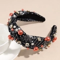 Dettaglio del cerchietto per Halloween con ragnatela argento, perle e strass lucidi - Ragnatela Nero