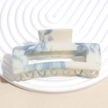 Detailed view of large square claw clip with blue floral pattern on creamy white acetate - Beige Blue Floral