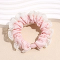 Sweet pink satin hair scrunchie with white lace edges and a matte pink bead detail - Pink