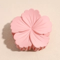 Detail of matte pink hibiscus flower hair claw clip with strong grip teeth for styling - Pink