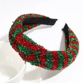 Detail eines breiten Weihnachts-Haarreifens mit glitzerndem rot-grünem Festtagsstoff - Knoten-Stil / Geknotet Rot Grün