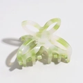 Detail view of small butterfly hair claw clip with white and green marble texture - White Green