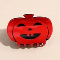 Pinza per capelli a zucca rossa lucida con viso Jack-O'-Lantern per Halloween - Mela Rossa