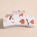 Macro detail of square hair claw clip featuring festive Halloween pumpkin and ghost patterns - White Pumpkin