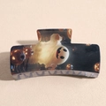 Close-up of black square hair claw clip featuring festive ghost and pumpkin patterns - Ghost Pumpkin