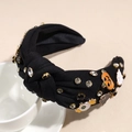 Detalle de diadema anudada de Halloween con pedrería, calabazas y colgantes de fantasmas - Negro