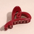 Close-up of deep red heart-shaped hair claw clip with a glossy finish and metal spring - Heart Claw Clip