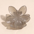 Detail of gray translucent flower hair claw clip with metal spring and matte finish - Jelly Grey