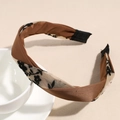 Détail du serre-tête tressé élégant marron café avec dentelle florale noire et satin - Grand Floral Brun