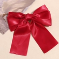 Detail of red satin double-layer bow hair clip with elegant long flowing ribbons - Burgundy